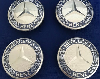 4 tapacubos Mercedes de 75 mm con emblema azul oscuro para llantas y centros de rueda. Nuevo.