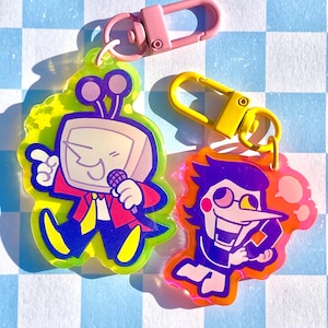 Tenna and Spamton epoxy charms