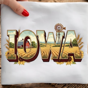 May include: White square fabric with the word "IOWA" in a 3D design. The letters are filled with images of a farm, windmill, and fields. Sunflowers and wheat stalks are at the bottom and sides of the letters.