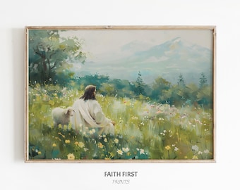 Könnte beinhalten: Ein gerahmter Druck einer idyllischen Szene. Das Kunstwerk zeigt eine Figur in weißen Gewändern, die in einem Feld mit Wildblumen mit einem Lamm sitzt. Berge und Bäume sind im Hintergrund. Der Druck ist in einem Holzrahmen. Der Text "FAITH FIRST PRINTS" steht unten.