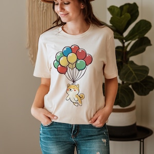 Shiba Inu Balloon Shirt, Shiba T-Shirt, Cute Shiba Inu Floating with Balloons Graphic Shirt, Whimsical Dog Tee, Adorable Shiba Inu Gift