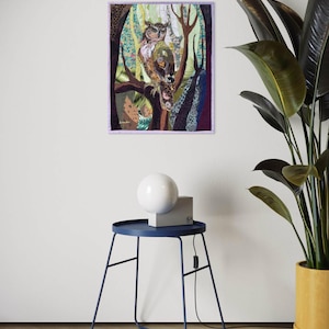 Textile owl artwork displayed as woodland-inspired wall decor in a cozy living room or study.