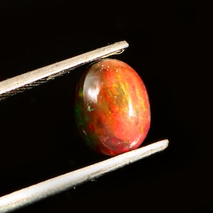 AAAAA Grade Natural Black Opal Cabochon Gemstone+Welo Fire Black Opal+ Handmade Oval Shape Opal+October Birthstone Gemstone, Size 9X7X4 MM.