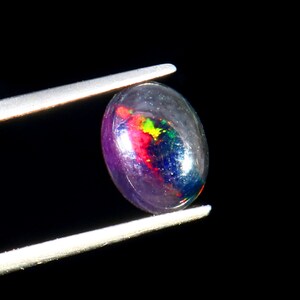 AAAAA Grade Natural Black Opal Cabochon Gemstone+Welo Fire Black Opal+ Handmade Oval Shape Opal+October Birthstone Gemstone, Size 9x7 MM.