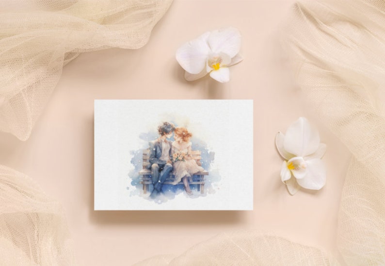 Romantic card display with watercolor couple art and white orchids on a soft peach background.