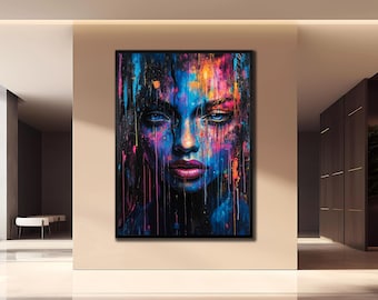 Puede incluir: Retrato abstracto enmarcado de una mujer con ojos azules y labios rosados. La obra presenta una vibrante paleta de colores de azules, rosas y naranjas, con gotas de pintura que caen en cascada por la cara, creando un efecto visual impactante.