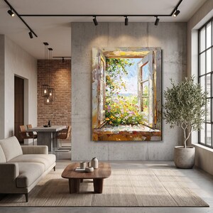 May include: A large rectangular wall art piece featuring an oil painting of an open window looking out onto a vibrant garden with yellow, pink, and green flowers under a bright sky. The painting uses thick, textured brushstrokes and warm tones.