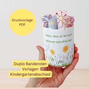 Può includere: Modello PDF stampabile per un vaso di fiori con il testo "Danke, dass du mir beim Wachsen geholfen hast" (Grazie per avermi aiutato a crescere). Il modello è progettato per essere utilizzato con blocchi di costruzione Duplo ed è ideale per la fine dell'anno all'asilo.