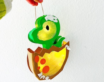 Modelo de artesanato de lanterna de dinossauro; download em PDF para instruções de artesanato para uma lanterna infantil de dinossauro a partir do ovo, dinossauro SVG