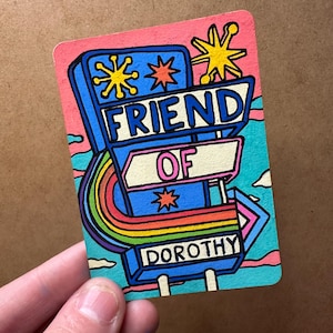 May include: A set of three ceramic mugs with a speckled, matte finish. The mugs are in shades of cream, light gray, and dark gray. Each mug has a simple, minimalist design, perfect for coffee or tea.