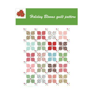 Op de afbeelding: Een kleurrijk quiltpatroon met een herhalend bloemmotief in tinten rood, roze, groen en blauw. De quiltblokken zijn gerangschikt in een rasterpatroon. De tekst "Holiday Blooms quilt pattern" wordt hierboven weergegeven.