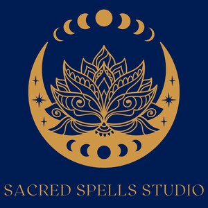 May include: A gold stylized illustration of a lotus flower inside a crescent moon with a circle and crescent moon phases around the outside. The text "SACRED SPELLS STUDIO" is below the image.