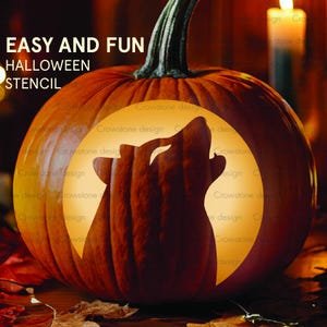 May include: An orange pumpkin with a carved howling wolf design illuminated from within. The image includes the text "EASY AND FUN HALLOWEEN STENCIL". The pumpkin is a festive decoration for Halloween.