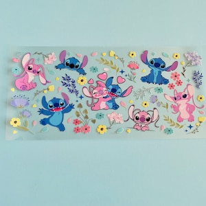 May include: A sheet of colorful stickers featuring various cartoon characters from the Disney movie Lilo & Stitch. The stickers feature Stitch and Angel in various poses, including hugging, smiling, and waving. The stickers are surrounded by flowers and other decorative elements.