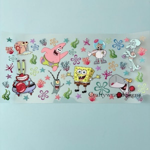 May include: A sheet of colorful cartoon character stickers featuring SpongeBob SquarePants, Patrick Star, Squidward Tentacles, and other characters. The stickers include coral, starfish, and flowers. The text "Craftywrapdesigns" is visible.
