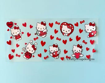May include: A clear rectangular sticker sheet featuring multiple Hello Kitty characters in red dresses and bows, surrounded by red hearts and bows. The sheet has the text "Craftywrapdesigns" in the bottom right corner. The background is a light blue.
