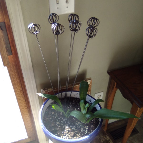 Raw steel garden stakes seven pieces