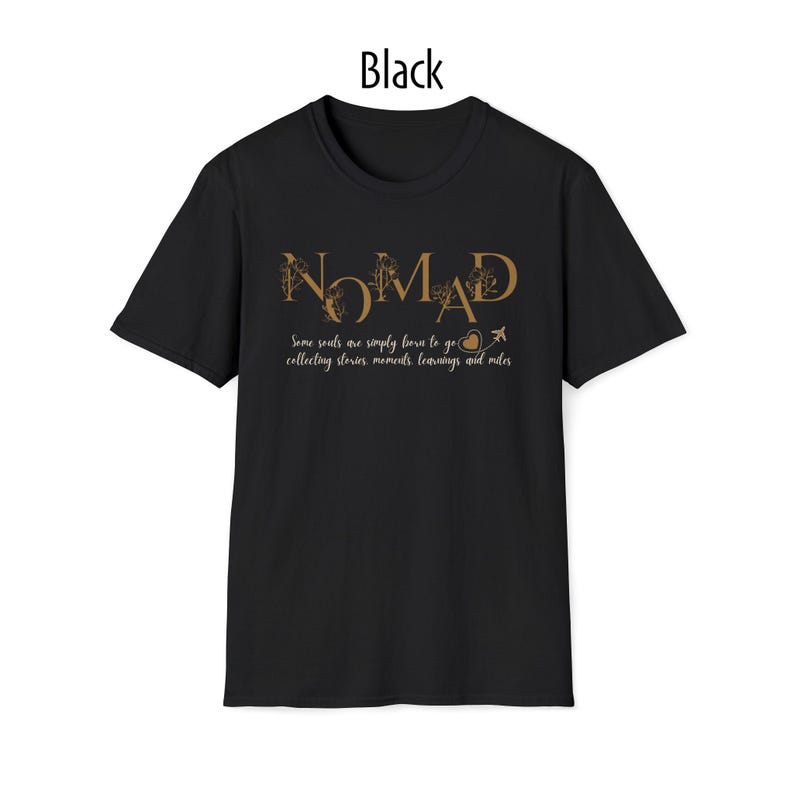 May include: Black crew neck t-shirt with the word "NOMAD" in a gold font. The shirt also features the text "Some souls are simply born to go collecting stories, moments, learnings and miles."