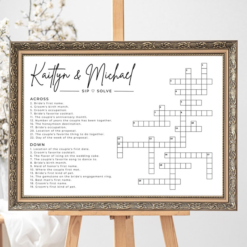 May include: A printable crossword puzzle game for a wedding shower or bridal party. The puzzle is titled "Kaitlyn & Michael - Sip & Solve". The crossword puzzle has 22 clues across and down, with questions about the couple's relationship, personal details, and wedding plans.