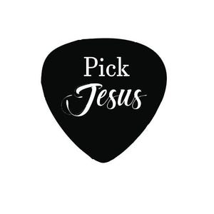 May include: Black guitar pick with the words "Pick Jesus" in white script. The pick is a teardrop shape, and the text is centered on the pick.