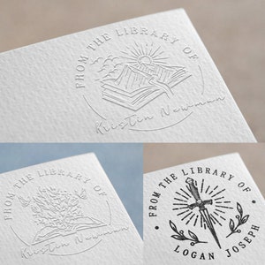 May include: Three different bookplate designs. The first design features a book with a mountain range and sun in the background. The second design features a book with a floral design. The third design features a sword with a sunburst and leaves. All designs include the text "From the Library of" and the name of the owner.