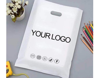 Logotipo personalizado Bolsas de compras blancas Mercancía Bolsas de venta al por menor de plástico brillante para compras, obsequios de fiesta, cumpleaños, fiestas, bolsas con asa con logotipo