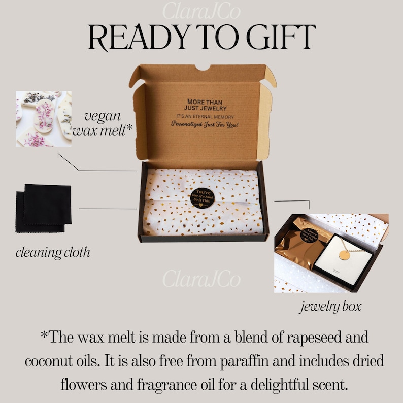 May include: A gift box set containing a vegan wax melt, a cleaning cloth, and a jewelry box. The wax melt is made from a blend of rapeseed and coconut oils, is free from paraffin, and includes dried flowers and fragrance oil. The box is decorated with the text "More than just jewelry. It's an eternal memory. Personalized just for you!" and "Clara Co."