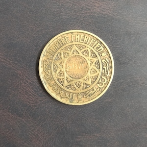 Rare Moroccan 50 Francs Metal Coin minted in 1371 (1952).