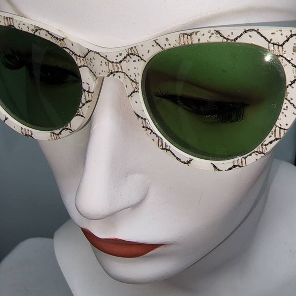 Vintage 1950s sunglasses white cat eye glasses gold glitter geometric details green lenses cool ray polaroid mid century rockabilly