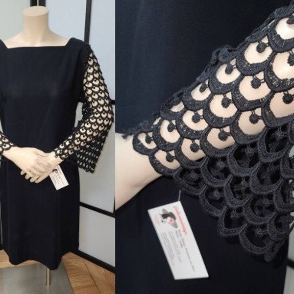 Vintage cocktail dress 1960s black rayon mod little black dress open crochet bell sleeves bow on back mod m