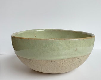 Handmade ceramic bowl mint green on speckled clay. For fruit, salades...