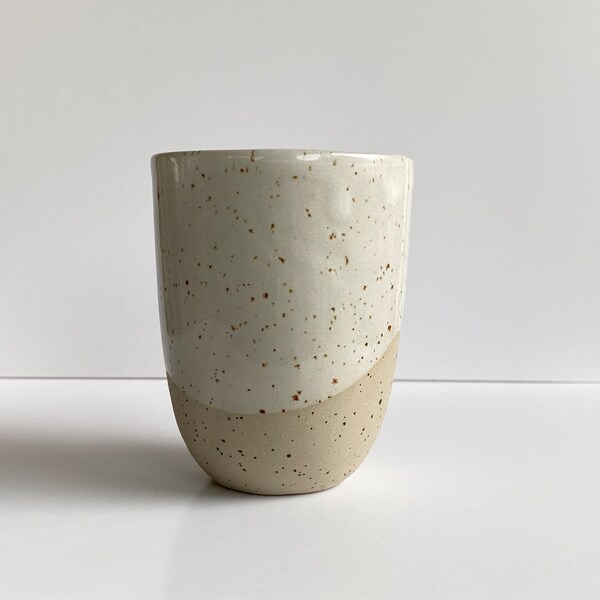 Handmade ceramic cup shiny white glaze with speckles
