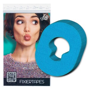 Könnte beinhalten: Eine Packung mit 10 blauen Klebebändern aus Stoff mit einem Loch in der Mitte. Der Text "FIXIERTAPES" ist auf der Verpackung aufgedruckt.
