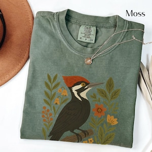 Pileated Woodpecker Shirt | Folk Art Bird Illustration | Whimsical Floral Design for Nature Lovers | Gift for Birder  | Gardner Shirt