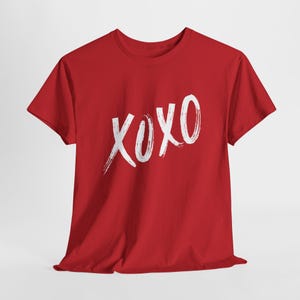 a red t - shirt with the word xoxo printed on it