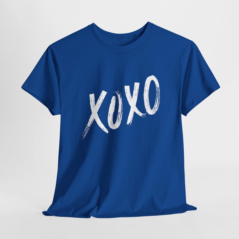a blue t - shirt with the word xoxo printed on it