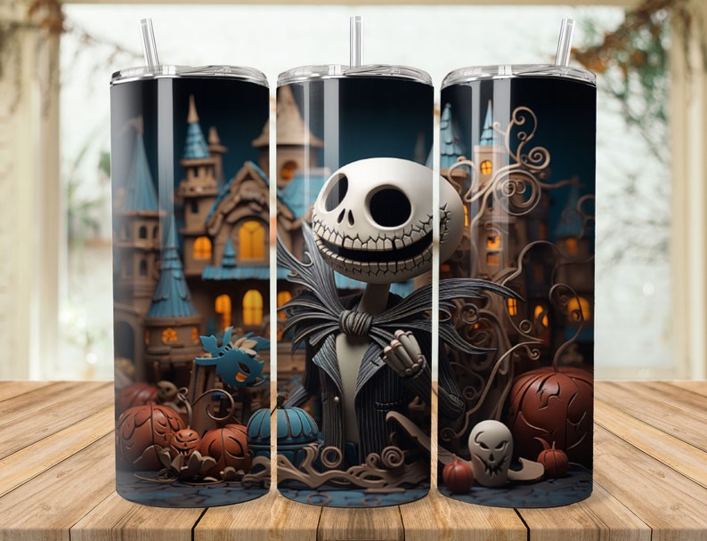 a set of three travel mugs with jack skellingy on them