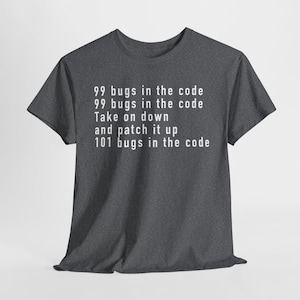 May include: A dark grey t-shirt with white text that reads "99 bugs in the code 99 bugs in the code Take on down and patch it up 101 bugs in the code".