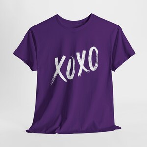 a purple shirt with the word xoxo printed on it