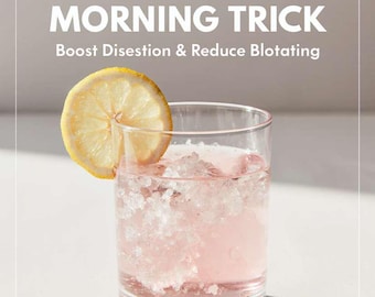May include: A clear glass filled with pink liquid and ice, garnished with a lemon slice. The text reads "THE PINK SALT MORNING TRICK" and "Boost Disestion & Reduce Bloting". The drink is set against a white background.