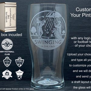 May include: A clear pint glass with a golf-themed design, featuring two golfers in the rain, with the text "Swinging in the Rain." The image also includes a beer glass, a gift box, and football club logos. Text on the glass can be customized.