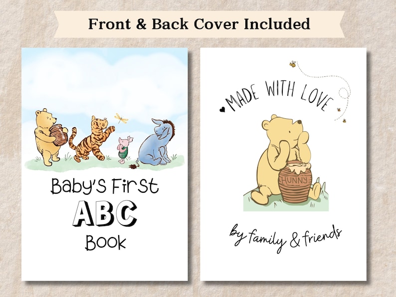 Op de afbeelding: Een Winnie de Poeh-thema baby's eerste ABC-boek met een vooromslag met Winnie de Poeh, Tigger, Biggetje en Eeyore. De achterkant toont Winnie de Poeh met een pot honing en de tekst "Made with Love by family & friends".