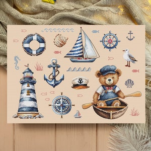 May include: A set of nautical themed cross stitch patterns featuring a lighthouse, sailboat, anchor, compass, teddy bear in a boat, seagull, life preserver, and other nautical elements.