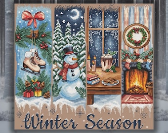 Puede incluir: Una obra de arte de punto de cruz que representa escenas de invierno. La obra de arte incluye patines de hielo, un muñeco de nieve, una ventana con una taza de chocolate caliente y una chimenea. Las palabras "Winter Season" están bordadas en azul marino en la parte inferior.