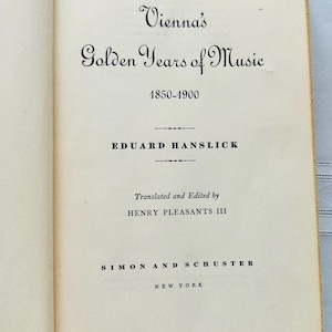 May include: A book titled "Vienna's Golden Years of Music 1850-1900" by Eduard Hanslick, translated and edited by Henry Pleasants III, published by Simon and Schuster, New York.