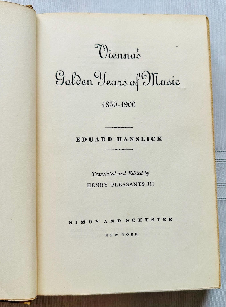 May include: A book titled "Vienna's Golden Years of Music 1850-1900" by Eduard Hanslick, translated and edited by Henry Pleasants III, published by Simon and Schuster, New York.