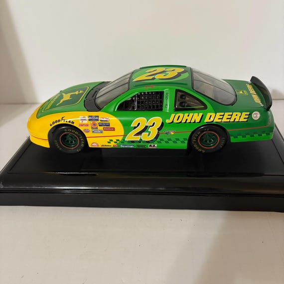 A #23 John Deere Pontiac Grand Prix Driven by Chad Little in the