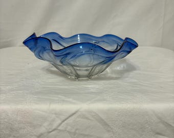 Cobalt blue to clear hand-blown glass bowl.