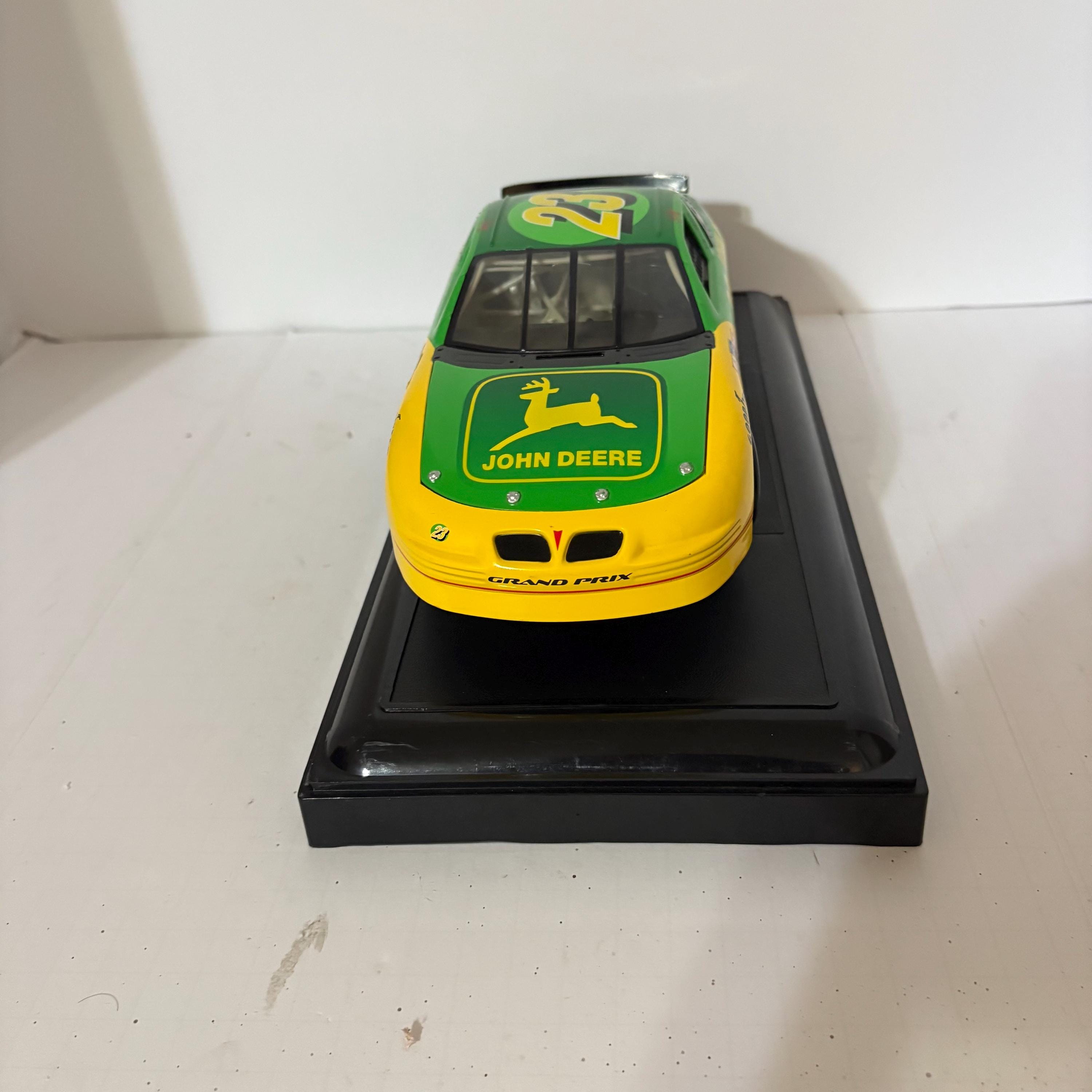 A #23 John Deere Pontiac Grand Prix Driven by Chad Little in the