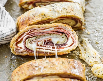 Homemade Stromboli made with homemade pizza dough. Appetizer, snack, Super Bowl food, stuffed pizza bread